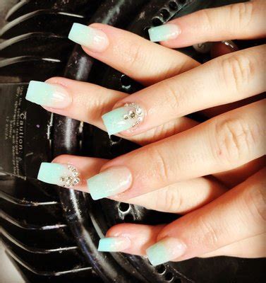 If you’re a fan of nail art, then you know how important it is to stay on top of the latest trends. One trend that has been making waves in the beauty world lately is blue nails. F...